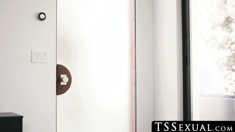 TSSexual.com - Two stunning tranny babes engage in a wild interracial anal fuck