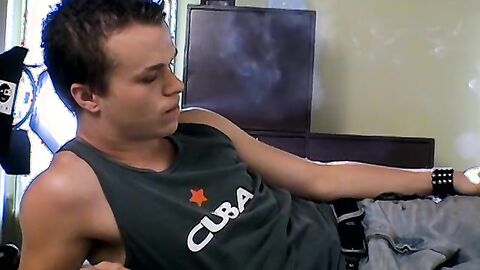 Tattooed Holden pullout cock and shoots load on his chest while blowing smoke