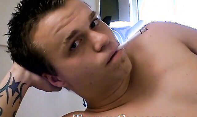 Tattooed Holden pullout cock and shoots load on his chest while blowing smoke