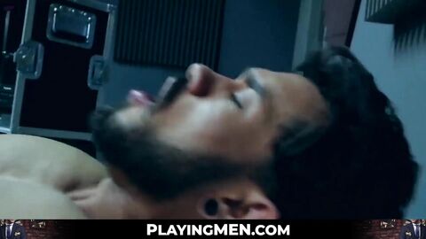 PlayingMen.com - Elegant hunk wears slick blue suit while ramming hot stud deeply and