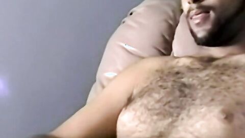 Bearded dude with hair on chest jerks off in amateur video
