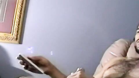 Bearded dude with hair on chest jerks off in amateur video