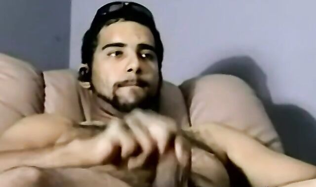 Bearded dude with hair on chest jerks off in amateur video