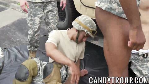 Military guys in an interracial outdoor gay orgy