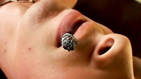 This hot smooth country jock chainsmokes while stroking and using a buttplug