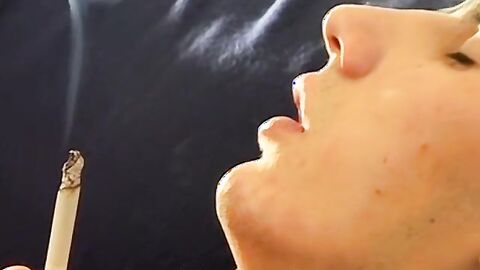 Hung Antony puffs his cigarette while stroking his big dick