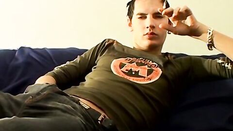 Hung Antony puffs his cigarette while stroking his big dick