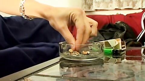 Hung Antony puffs his cigarette while stroking his big dick
