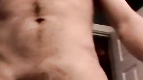 Young athletic amateur strokes his big dick and unloads jizz