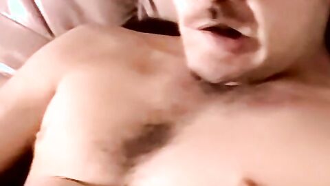Young athletic amateur strokes his big dick and unloads jizz