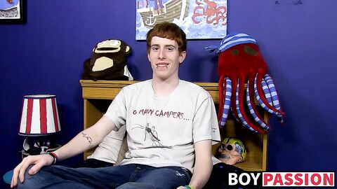 Guy with red hair gets interviewed before a solo session