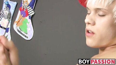 Skinny twink Ashton Cody shoves candy cane dildo up his ass