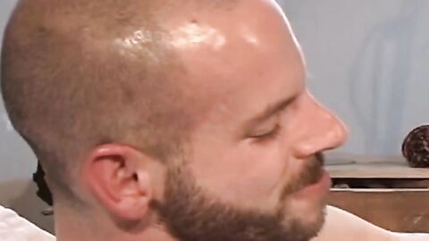 His eyes roll back in his head as he takes fist after fist until the energy builds to