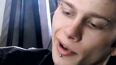 Attractive Ian Madrox is blowing smoke and starts stretching his cock in his smoky je