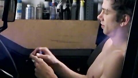 Attractive Ian Madrox is blowing smoke and starts stretching his cock in his smoky je