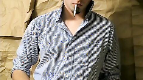 Hottie Ashley firing up his smoke before stroking his big dickÂ