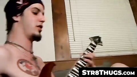 Str8Thugs.com - Straight thug Axel strums his cock while playing with his guitar