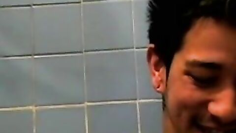 Amateur tattooed twink with a tan showers in classics porn