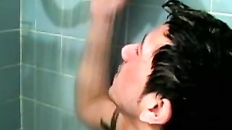 Amateur tattooed twink with a tan showers in classics porn