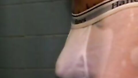 Amateur tattooed twink with a tan showers in classics porn