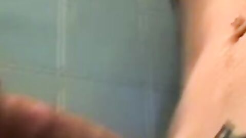Amateur tattooed twink with a tan showers in classics porn