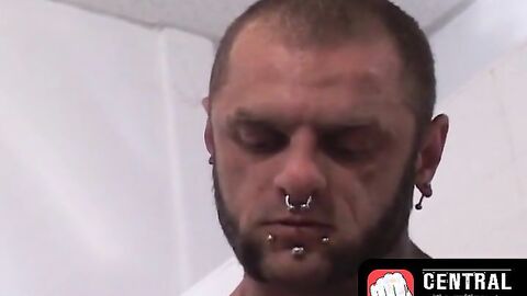 CentralFisting.com - Inked gay releases enema fluid on face sitting homo during kinky