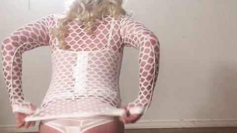 Crossdresser Misty Cane's Striptease in White Lingerie