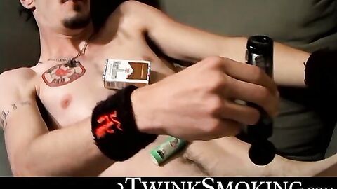 Straight rocker Axel plays his guitar and his throbbing cock with his pack of cigaret