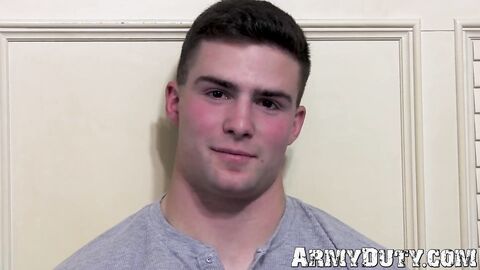 Brunette trooper Thomas Woods plays with his big dick in front of the camera