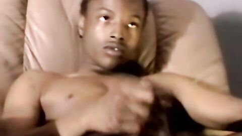 Black amateur strokes his dick before his lover eats his cum