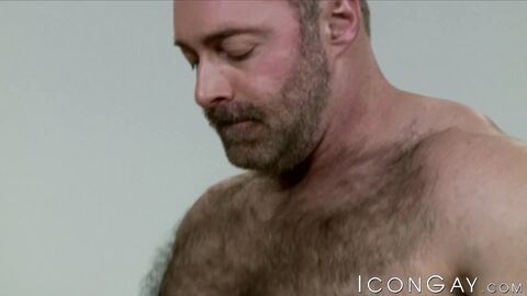 Hairy DILF Brad Kalvo gets his cock worshipped by two slender bi dudes