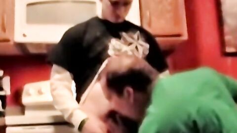 Gay amateur sucks a big fat cock in kinky threesome