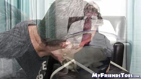 Blindfolded hunk with gag ball in his mouth feet licked
