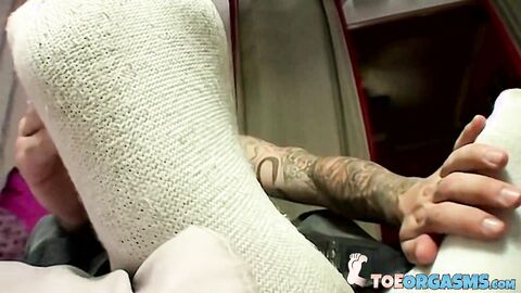 Stunning young jock Evan Heinze plays with his delicious dick using his sexy feet
