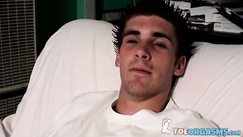 Young Evan Heinze saves up his cum load for his sexy naked foot show