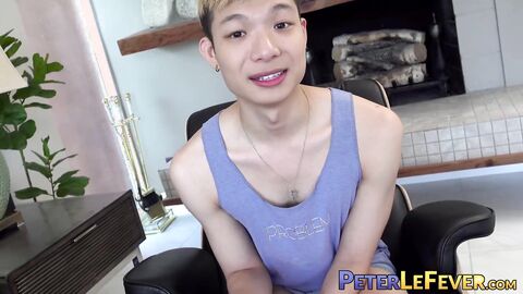 Sweet looking twink Kai Cho tugs his meaty bulge and cums all over himself