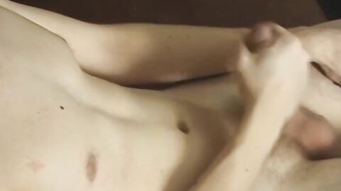 Long haired twink Logan Miles masturbates his thick cock