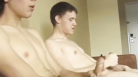 Long haired twink Logan Miles masturbates his thick cock