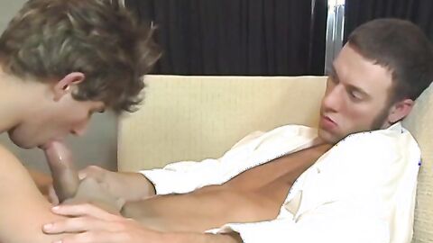 Handsome twink Sean Corwin sucking big rock hard cock