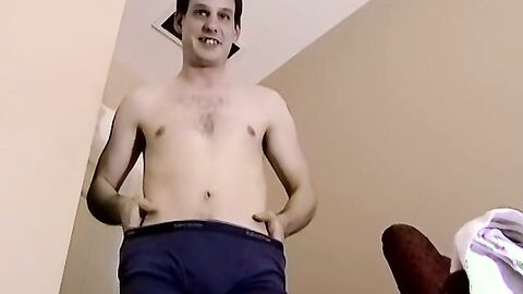 Homo is playing with his shaft and cums while watching porn