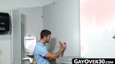 GayOver30.com - Sexy hunk Mike fucks cute Austin through the glory hole relentlessly