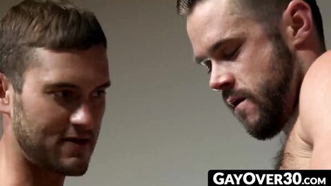 GayOver30.com - Sexy hunk Mike fucks cute Austin through the glory hole relentlessly