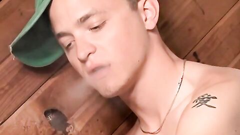 Charismatic Justin lights up his smoke after he shoots his loads on his chest