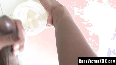 CodyVictorXXX.com - Cute black guy plays with his big black cock and fleshlight hard