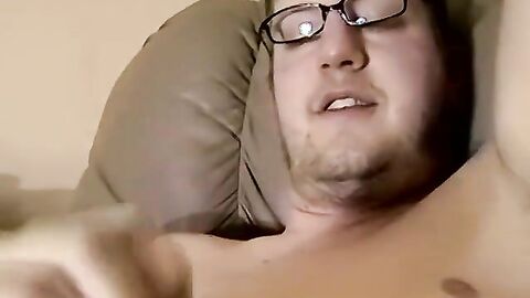 JoeSchmoeXXX.com - Cute amateur Jack with glasses jerks off on a leather sofa