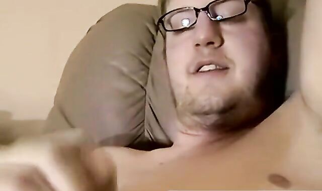 JoeSchmoeXXX.com - Cute amateur Jack with glasses jerks off on a leather sofa