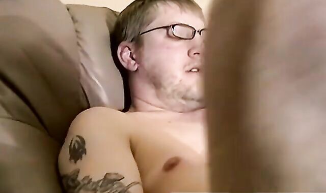 JoeSchmoeXXX.com - Cute amateur Jack with glasses jerks off on a leather sofa