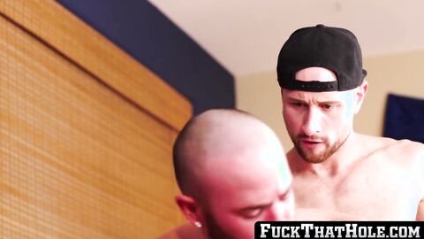 FuckThatHole.com - Bald bearded gay jock bends over to deep bareback butt bang his hu
