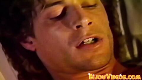 Buffed retro hottie Leigh Erickson wanks his aroused cock in front of us