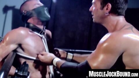 MuscleJockBound.com - Bound wrestler dominated and tormented by his tattooed opponent